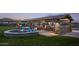 Community amenity with comfortable seating and a fire pit at 12308 W Parkway Ln, Avondale, AZ 85323