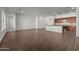 Spacious open floor plan includes a modern kitchen with center island, and recessed lighting at 12308 W Parkway Ln, Avondale, AZ 85323