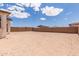 Large, flat backyard enclosed by a block wall, offering privacy and space for recreation at 18711 E Panchito Dr, Gold Canyon, AZ 85118