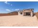 Expansive backyard with sturdy privacy fence and covered patio, perfect for outdoor living at 18711 E Panchito Dr, Gold Canyon, AZ 85118