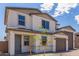 Charming two-story home with a three-car garage and well-maintained landscaping at 18711 E Panchito Dr, Gold Canyon, AZ 85118