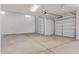 Large garage with insulated doors, concrete floor, and room for vehicles at 18711 E Panchito Dr, Gold Canyon, AZ 85118