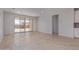 Bright living room with tile flooring and sliding glass doors to let the light in at 18711 E Panchito Dr, Gold Canyon, AZ 85118