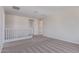 Neutral loft with light carpet, white railing, and access to other rooms at 18711 E Panchito Dr, Gold Canyon, AZ 85118