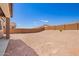 A desert backyard featuring low-maintenance landscaping, ready for personal touches and outdoor enjoyment at 18746 E Panchito Dr, Gold Canyon, AZ 85118