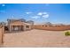 Spacious backyard with covered patio, ready for landscaping and outdoor living enhancements at 18746 E Panchito Dr, Gold Canyon, AZ 85118