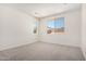 Bright bedroom with ample natural light from large windows, offering a serene and comfortable space at 18746 E Panchito Dr, Gold Canyon, AZ 85118