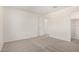 This is a bedroom with neutral carpet and access to the hallway and closet at 18746 E Panchito Dr, Gold Canyon, AZ 85118