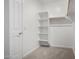 Walk-in closet with built-in shelving and a hanging rod at 18746 E Panchito Dr, Gold Canyon, AZ 85118