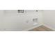 Functional laundry room highlighting essential water and electric hookups on a white wall at 18746 E Panchito Dr, Gold Canyon, AZ 85118