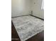 The bedroom has dark floors, neutral walls, and a sleek rug, creating a comfortable and modern feel at 1440 N Idaho Rd # 2041, Apache Junction, AZ 85119