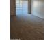 Bright living room featuring carpeted floors and access to outdoor space at 3131 W Cochise Dr # 149, Phoenix, AZ 85051