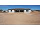 A backyard view of the house featuring a patio and spacious surroundings at 3295 W Mesquite St, Phoenix, AZ 85086