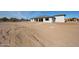 Rear exterior view of the home showing the patio and expansive space for outdoor living at 3295 W Mesquite St, Phoenix, AZ 85086