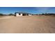 Home's exterior view highlighting the backyard and patio area, perfect for outdoor activities at 3295 W Mesquite St, Phoenix, AZ 85086