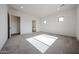 Bright bedroom featuring neutral carpet, recessed lights, and ensuite bathroom at 3295 W Mesquite St, Phoenix, AZ 85086