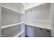 A closet with shelving and a clothing bar provides ample storage space at 3295 W Mesquite St, Phoenix, AZ 85086