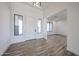 Bright entryway with modern lighting and tile floors at 3295 W Mesquite St, Phoenix, AZ 85086