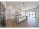 Gorgeous kitchen featuring a large center island, stainless steel appliances, and a modern design at 3295 W Mesquite St, Phoenix, AZ 85086