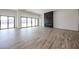 Bright living area featuring tile floors, a modern fireplace, and mountain views at 3295 W Mesquite St, Phoenix, AZ 85086