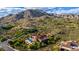 Aerial view of a sprawling home with a pool and mountain views at 42383 N 111Th Pl, Scottsdale, AZ 85262