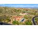 Expansive desert property featuring a luxurious home with a pool and scenic mountain views at 42383 N 111Th Pl, Scottsdale, AZ 85262
