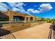 Beautiful backyard area featuring a covered patio, pool, mountain views, and a travertine patio at 42383 N 111Th Pl, Scottsdale, AZ 85262