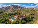 Luxury estate with a private pool, desert landscaping, and mountain views in a private community at 42383 N 111Th Pl, Scottsdale, AZ 85262