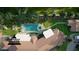 Stunning aerial view of a home with a pool, lush landscaping, and modern outdoor seating area at 2222 N Val Vista Dr # 3, Mesa, AZ 85213