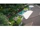 Picturesque aerial view of a home with a pool, patio, and lush green landscaping at 2222 N Val Vista Dr # 3, Mesa, AZ 85213