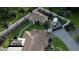 Aerial view of a property showcasing a well-manicured yard, and gated driveway at 2222 N Val Vista Dr # 3, Mesa, AZ 85213