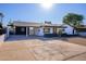 Newly remodeled mid-century modern home with clean lines and a bright white exterior at 3155 W Augusta Ave, Phoenix, AZ 85051