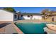 Refreshing backyard pool with a large patio perfect for relaxation and entertaining at 3155 W Augusta Ave, Phoenix, AZ 85051