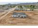 Aerial view of a new single-story home under construction with a two-car garage at 4550 N 192Nd Dr, Litchfield Park, AZ 85340