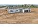 Aerial view of a new single-story home under construction with a two-car garage at 4550 N 192Nd Dr, Litchfield Park, AZ 85340