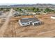 Aerial view of a new single-story home under construction with a two-car garage at 4550 N 192Nd Dr, Litchfield Park, AZ 85340