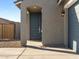 Gray exterior home with a gray front door and a covered entryway at 2659 E Santa Ynez Dr, Casa Grande, AZ 85194