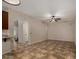 Cozy living room with neutral walls, contemporary flooring, archway to another room and lots of light at 955 S Henry Ln, Gilbert, AZ 85296