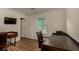 Bright home office features two desks, hardwood floors and natural light with a view at 955 S Henry Ln, Gilbert, AZ 85296