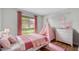 Charming bedroom with a playful pink color scheme and teepee at 1728 W Village Way, Tempe, AZ 85282