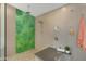 Walk-in shower features multiple shower heads and a stylish accent wall at 1859 N Morris --, Mesa, AZ 85201