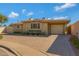 Charming single-story home featuring a brick driveway, manicured landscaping, and a one-car garage at 1859 N Morris --, Mesa, AZ 85201