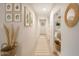 Hallway decorated with framed art and woven baskets at 1859 N Morris --, Mesa, AZ 85201