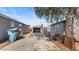 View of the backyard with a storage shed and partially paved area at 2612 E Sandra Ter, Phoenix, AZ 85032