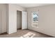 Simple bedroom with closet and window at 2612 E Sandra Ter, Phoenix, AZ 85032