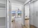 Bright bedroom with mirrored closet doors, ceiling fan, and beautiful view of the surrounding landscape at 10646 E Butherus Dr, Scottsdale, AZ 85255
