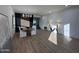 Bright dining room with modern chandelier and hardwood floors at 10646 E Butherus Dr, Scottsdale, AZ 85255