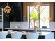 Contemporary kitchen island with breakfast bar and stylish pendant lighting at 10646 E Butherus Dr, Scottsdale, AZ 85255
