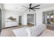 Bright main bedroom featuring a view of walk-in closet and attached bathroom at 10646 E Butherus Dr, Scottsdale, AZ 85255