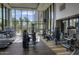 Well-equipped gym with modern treadmills, weights, and various fitness machines in a naturally lit space at 200 W Portland St # 614, Phoenix, AZ 85003